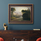 Romantic autumn landscape along the Hudson River by Thomas Doughty in an ornate bronzed mahogany wood frame displayed in a dark-toned interior setting.
