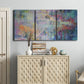 Three-panel canvas wall art featuring abstract evening landscape with depth, displayed above a cabinet in an entryway.