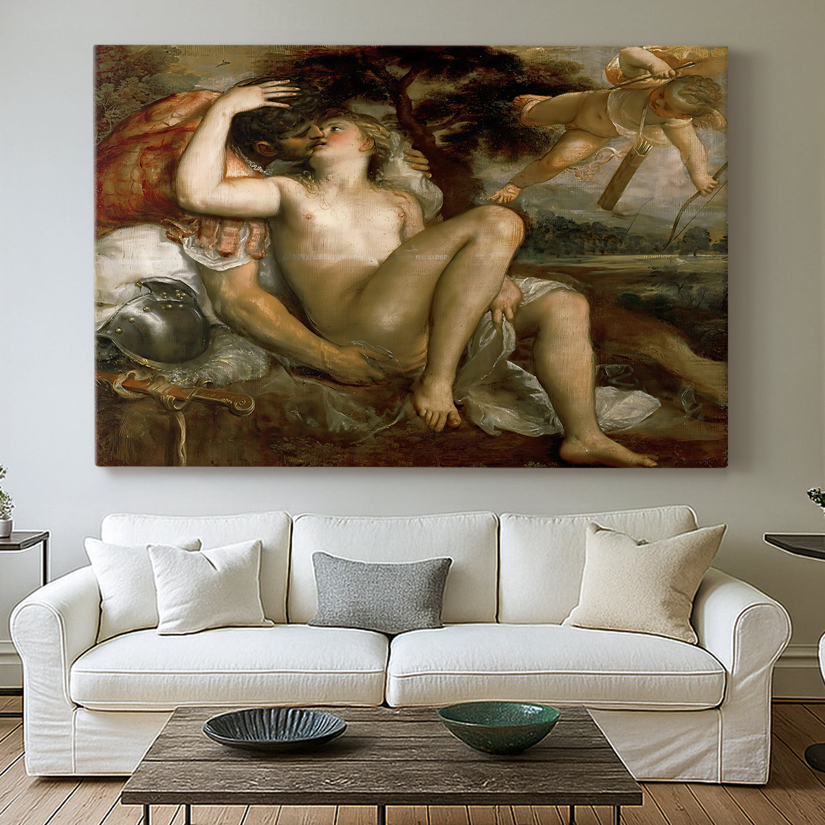 Canvas art print detailing a classical figure scene featuring Venus, Mars, and Cupid, centered above a sofa as a large focal wall piece