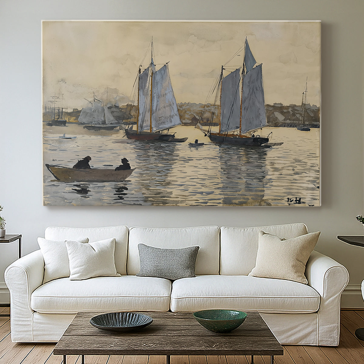 Canvas art print detailing a coastal view featuring two schooners under clear sky, centered above a sofa as a large focal wall piece
