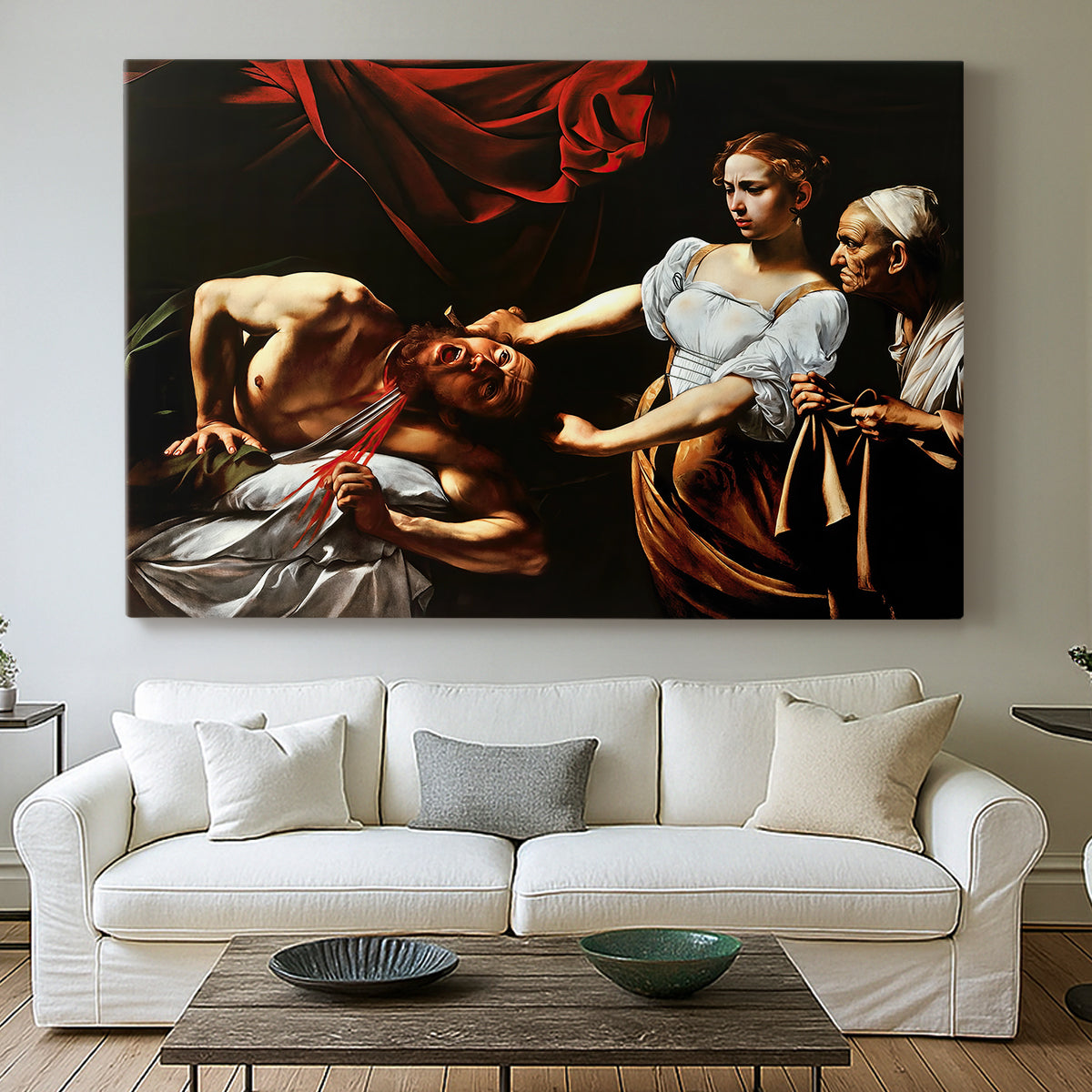 Canvas art print detailing a violent religious narrative with strong contrast of light and shadow, centered above a sofa as a large focal wall piece