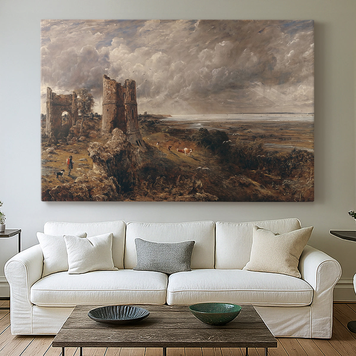 Canvas art print detailing a scenic view combining ruins and water, centered above a sofa as a large focal wall piece