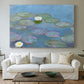 Canvas art print detailing a close-up of aquatic plants in still water, centered above a sofa as a large focal wall piece