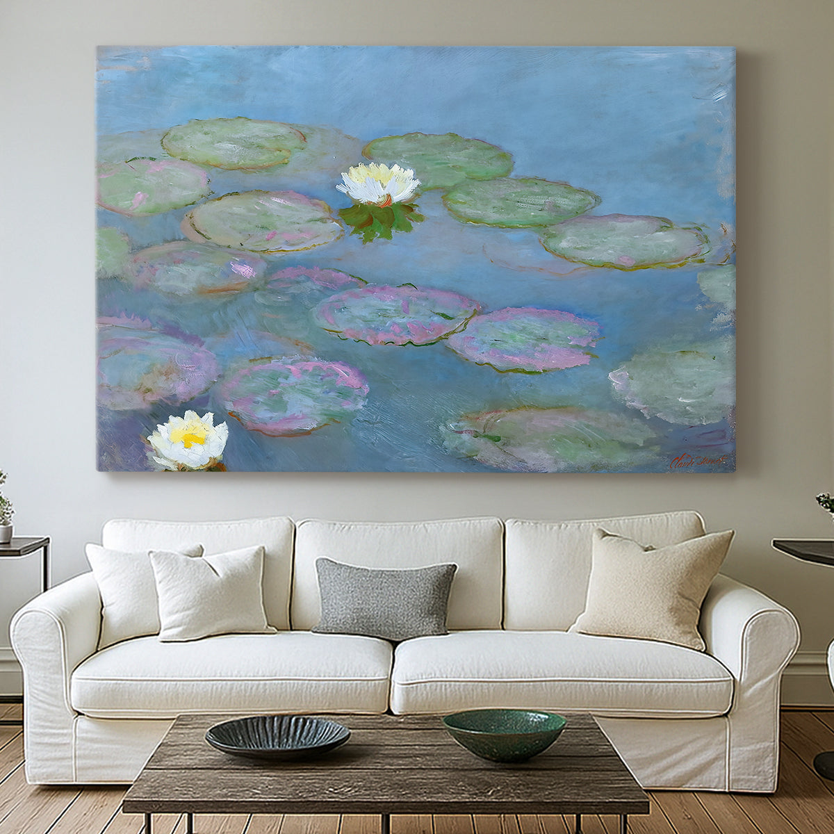 Canvas art print detailing a close-up of aquatic plants in still water, centered above a sofa as a large focal wall piece