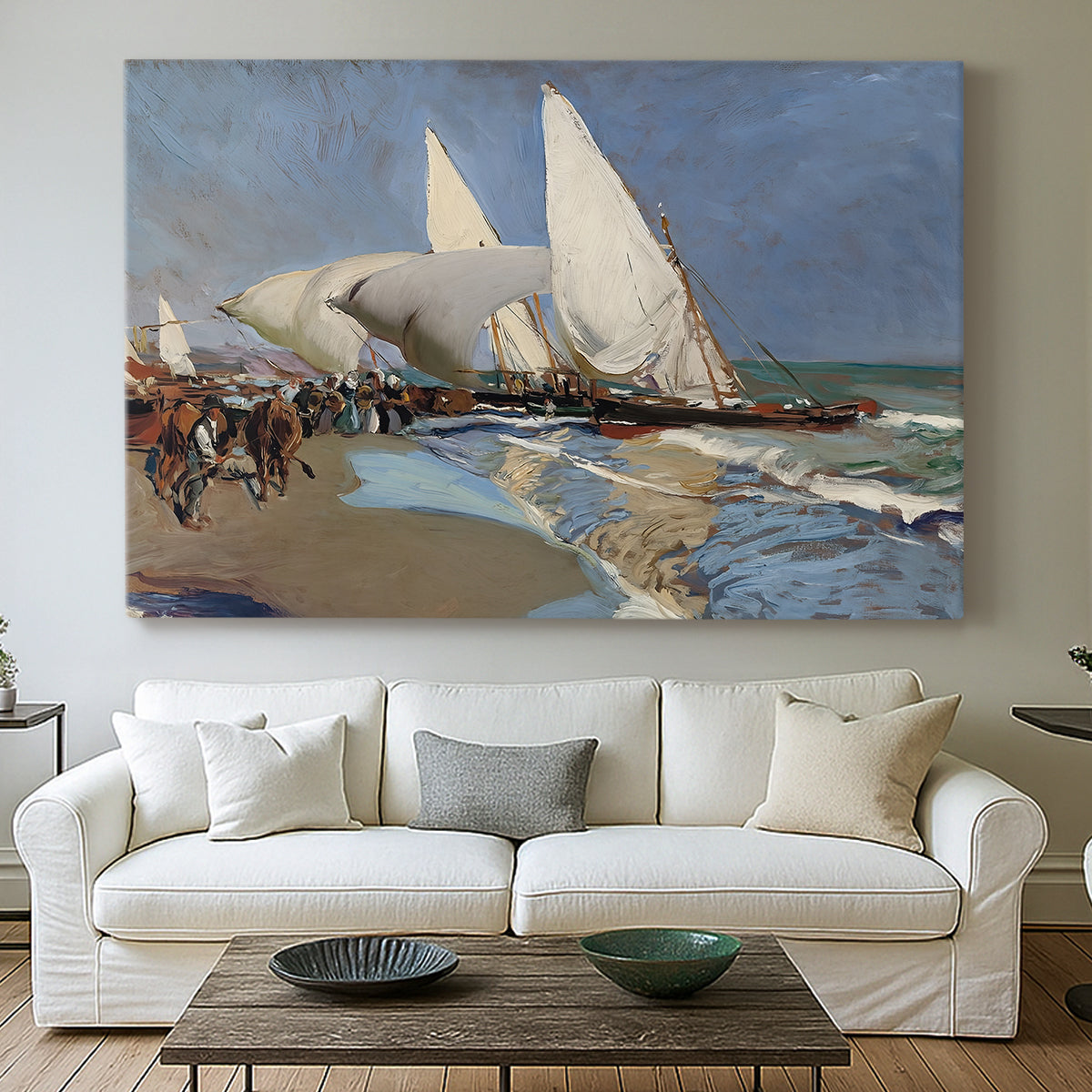 Canvas art print detailing a lively seaside composition with boats and people, centered above a sofa as a large focal wall piece