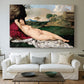 Canvas art print detailing a classical reclining nude surrounded by gentle landscape, centered above a sofa as a large focal wall piece