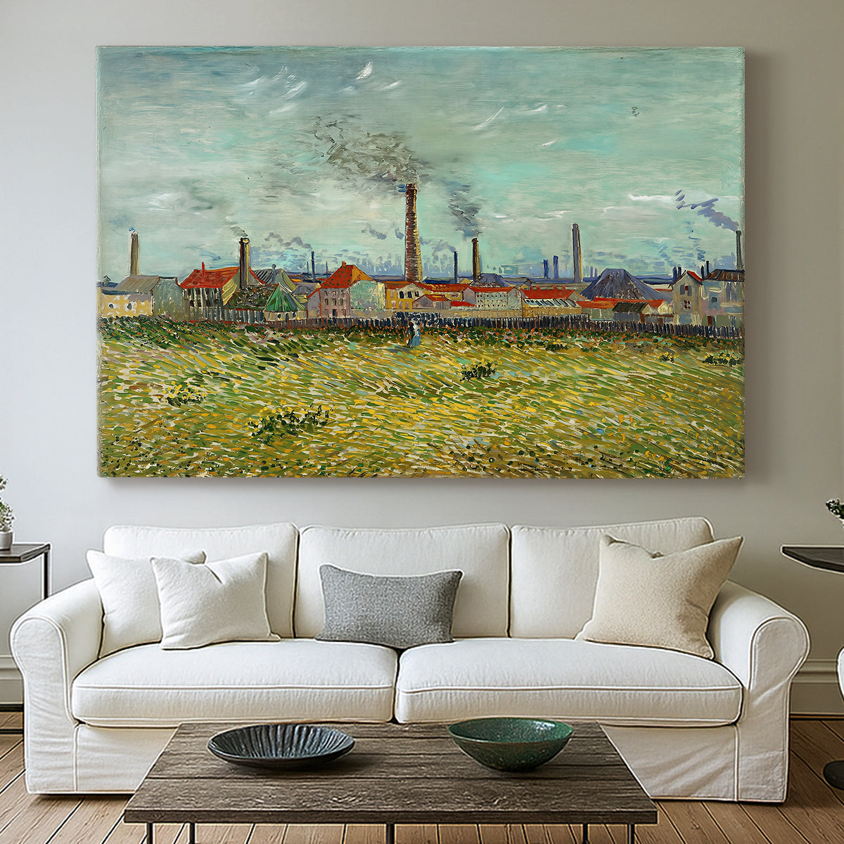 Canvas art print detailing a post-impressionist composition combining buildings and horizon, centered above a sofa as a large focal wall piece