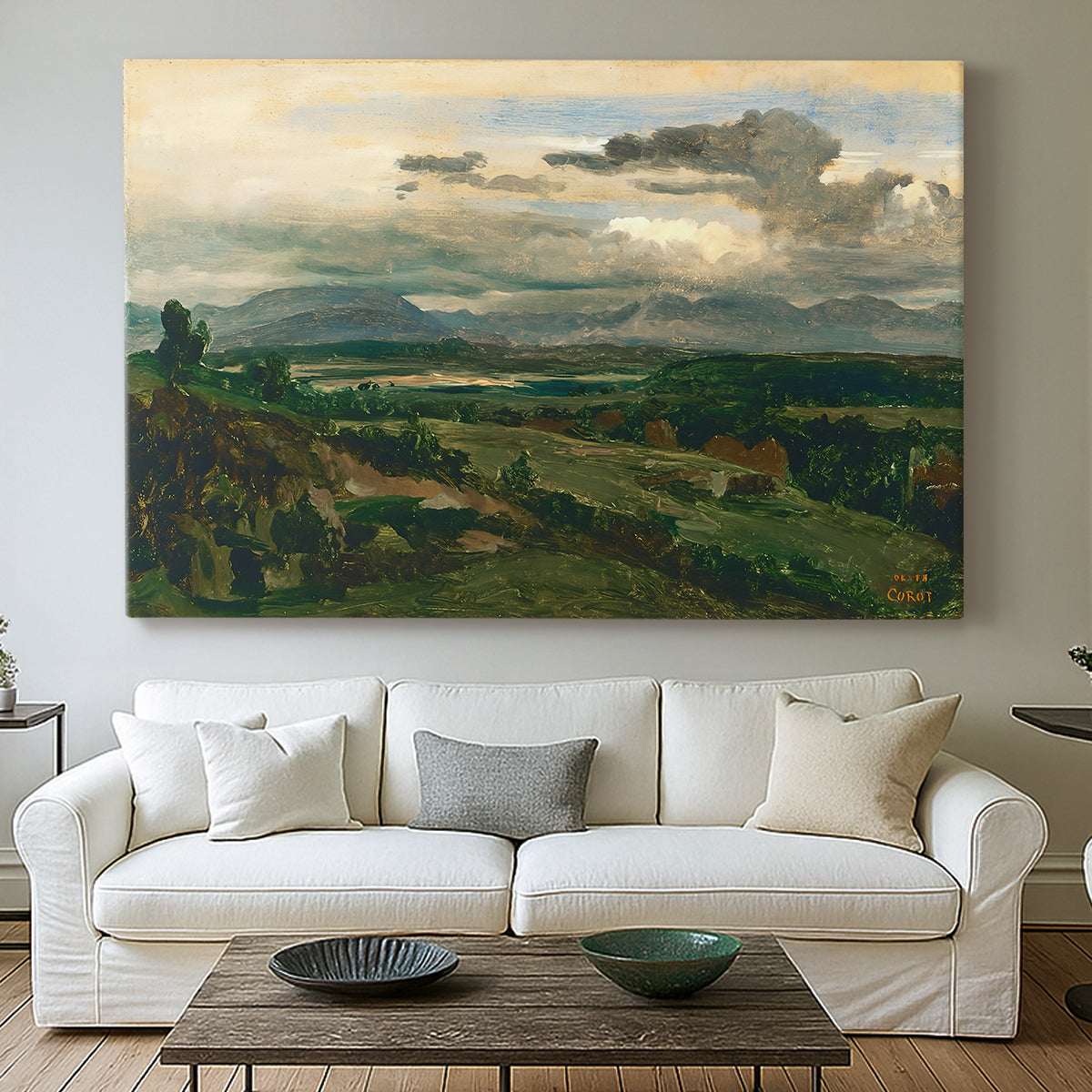 Canvas art print detailing a tranquil scene combining town and natural surroundings, centered above a sofa as a large focal wall piece
