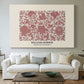 Canvas art print detailing a textile-style ornament with layered motifs and symmetry, centered above a sofa as a large focal wall piece