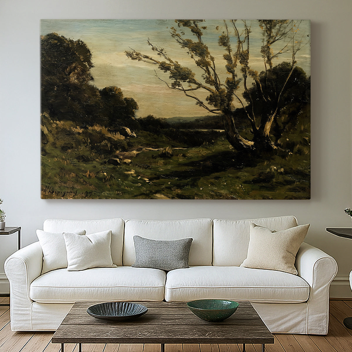 Canvas art print detailing a tranquil landscape capturing morning light and stillness, centered above a sofa as a large focal wall piece