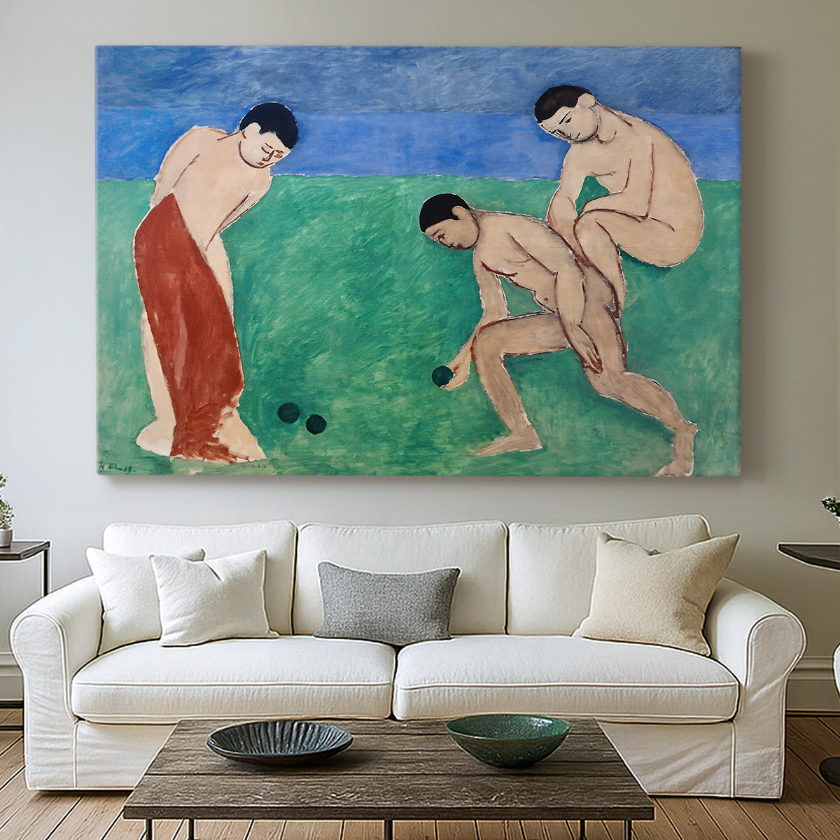 Canvas art print detailing a Fauvist composition of bowl players in a landscape, centered above a sofa as a large focal wall piece