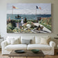 Canvas art print detailing a landscaped terrace with figures and flags near shoreline, centered above a sofa as a large focal wall piece