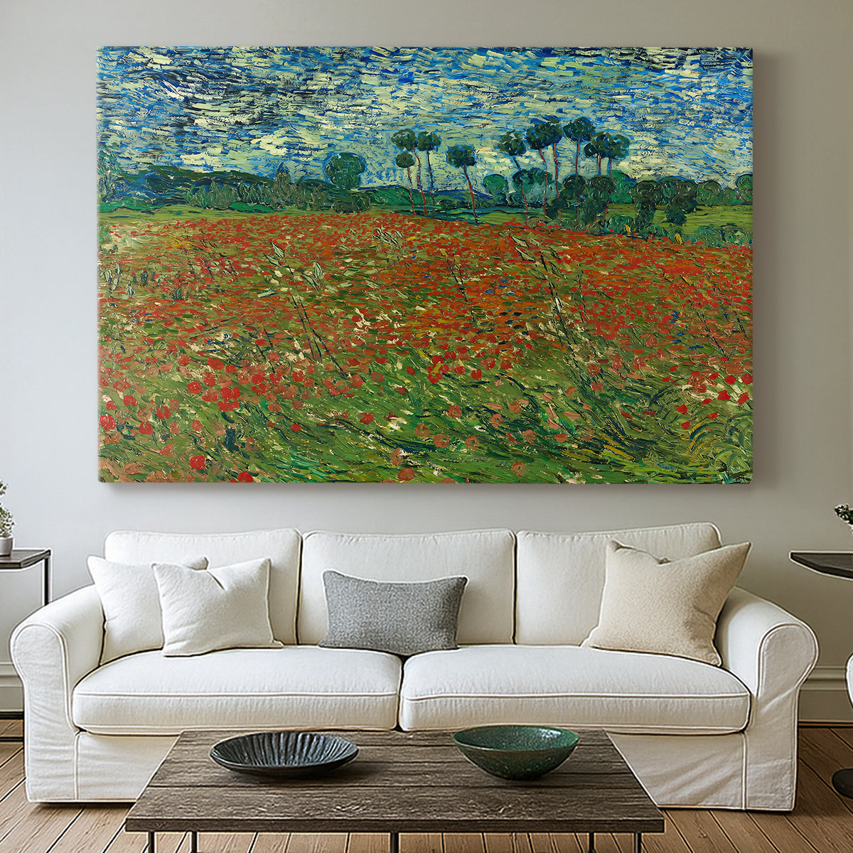 Canvas art print detailing an open field composition with low horizon and vegetation, centered above a sofa as a large focal wall piece