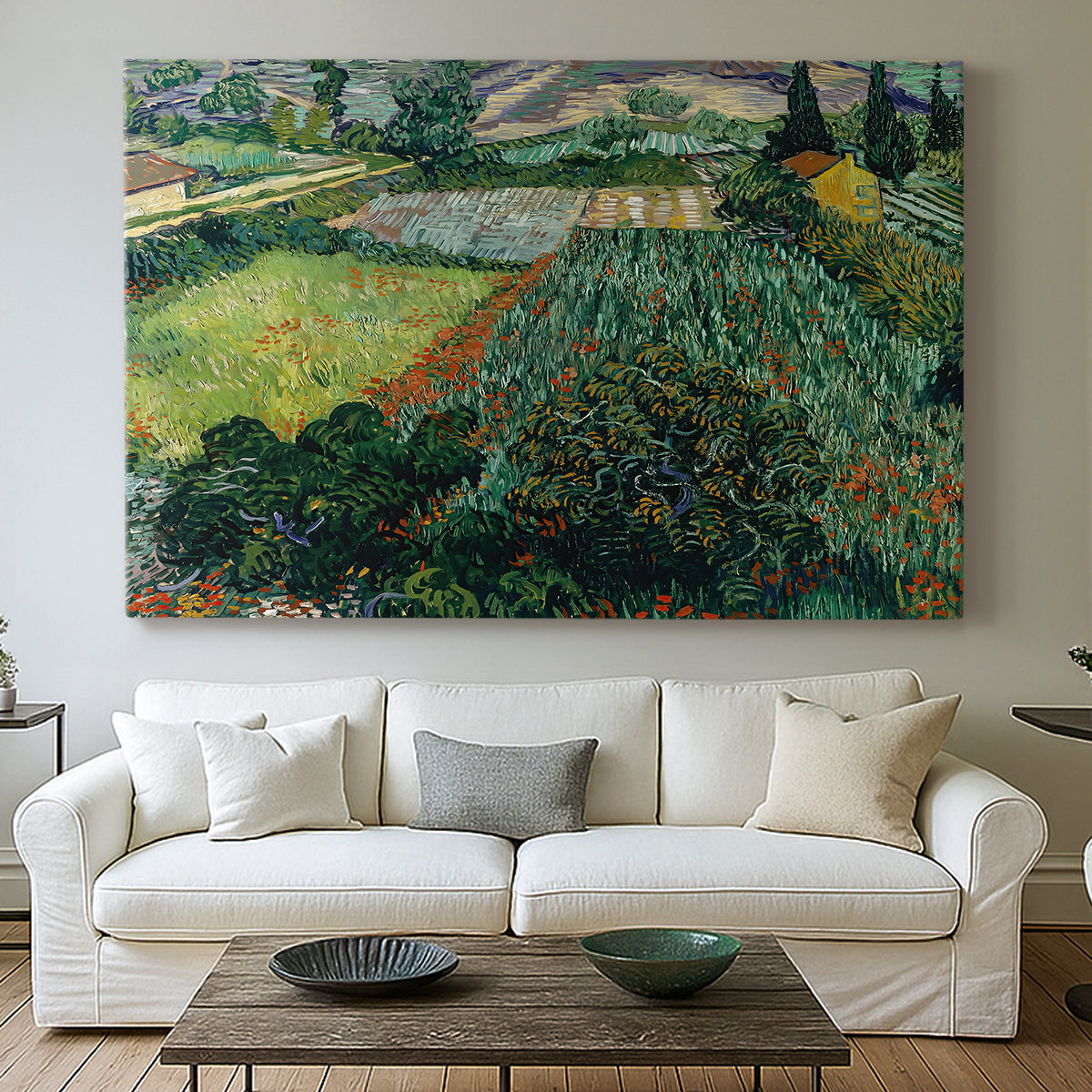 Canvas art print detailing a stylized field composition with vegetation, centered above a sofa as a large focal wall piece