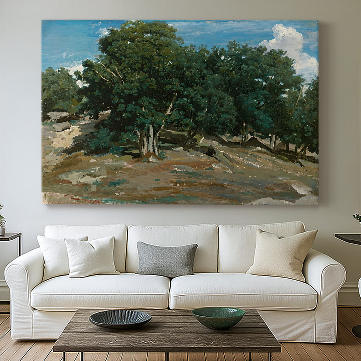 Canvas art print detailing a forest landscape emphasizing trees and space, centered above a sofa as a large focal wall piece