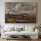 Canvas art print detailing a landscape emphasizing sky and open ground, centered above a sofa as a large focal wall piece