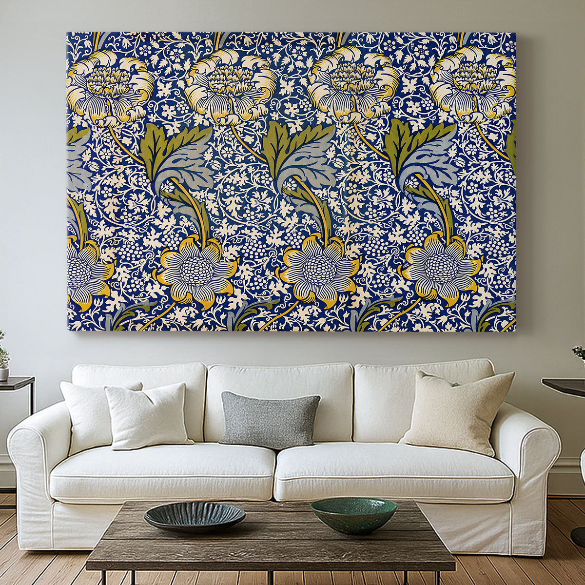 Canvas art print detailing a decorative composition with layered natural motifs and symmetry, centered above a sofa as a large focal wall piece
