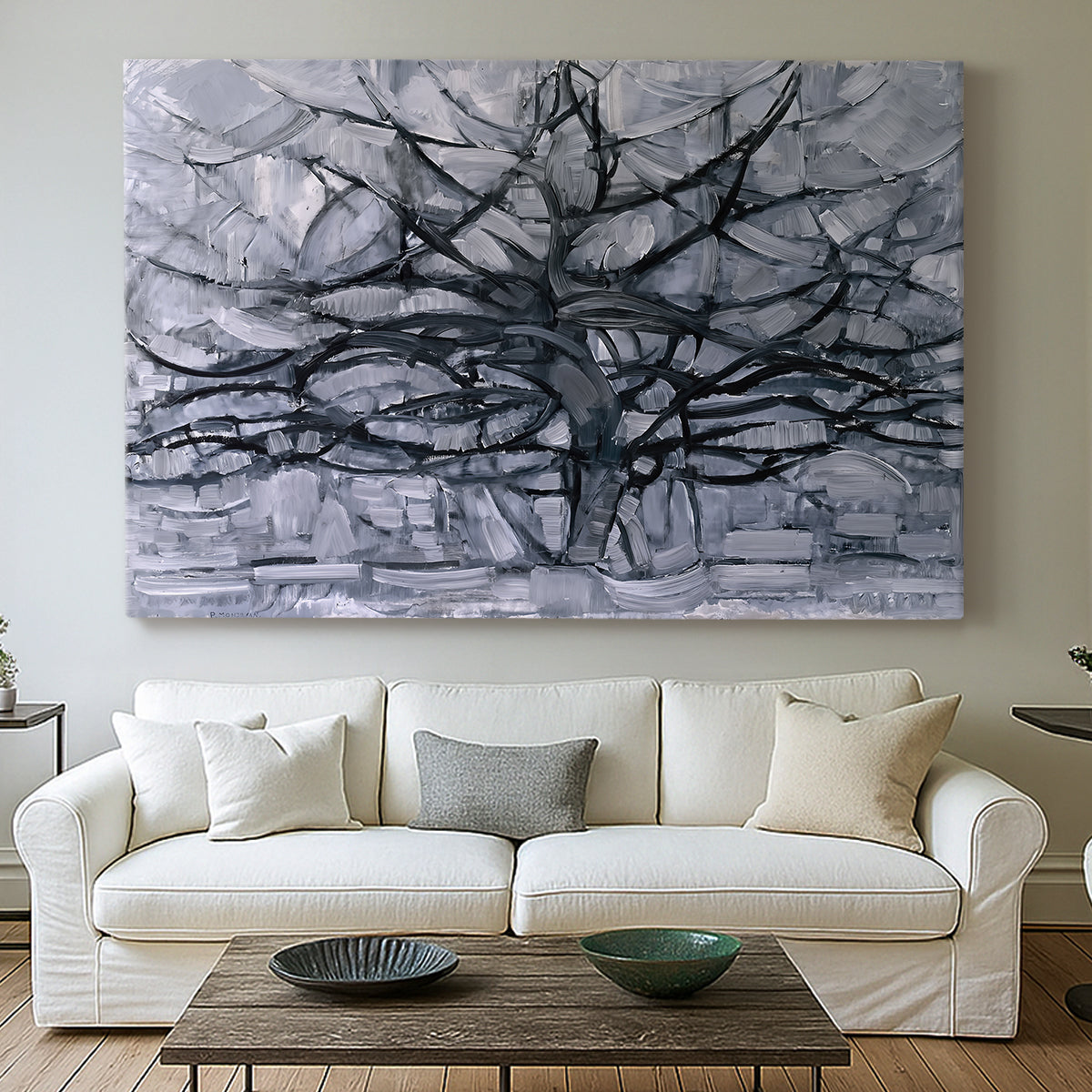Canvas art print detailing a transitional tree pattern, centered above a sofa as a large focal wall piece