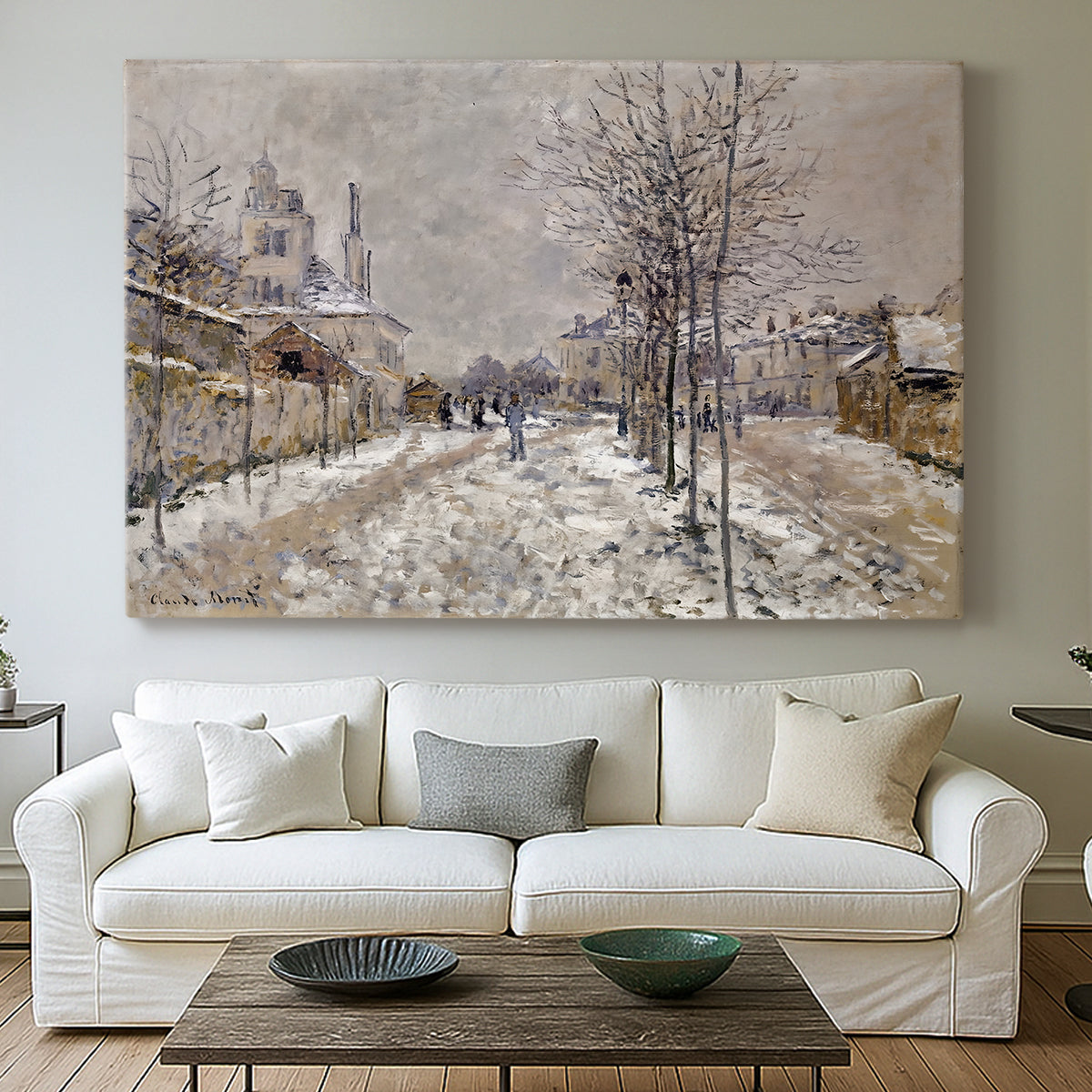 Canvas art print detailing an urban winter landscape with muted tones and soft light, centered above a sofa as a large focal wall piece