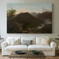 Canvas art print detailing a natural mountain scene illuminated by early morning light, centered above a sofa as a large focal wall piece