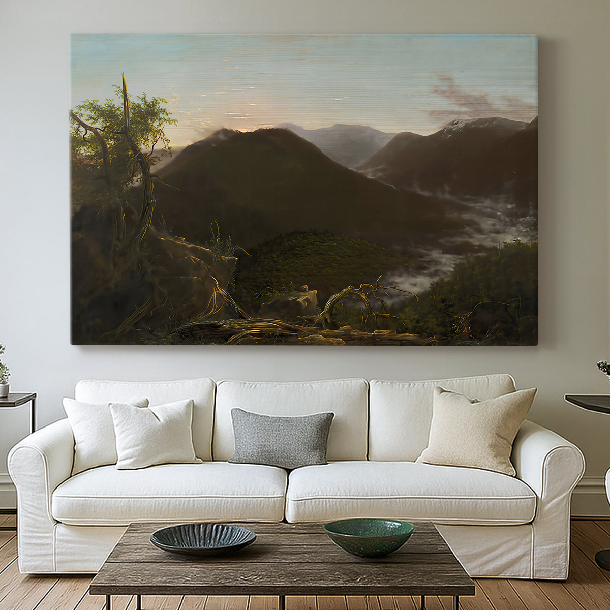 Canvas art print detailing a natural mountain scene illuminated by early morning light, centered above a sofa as a large focal wall piece