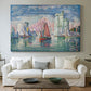 Canvas art print detailing a maritime landscape with harbor, centered above a sofa as a large focal wall piece