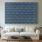 Canvas art print detailing a textile-style surface filled with small leaves and blossoms, centered above a sofa as a large focal wall piece