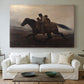 Canvas art print detailing figures on horse moving swiftly through shadowy landscape, centered above a sofa as a large focal wall piece