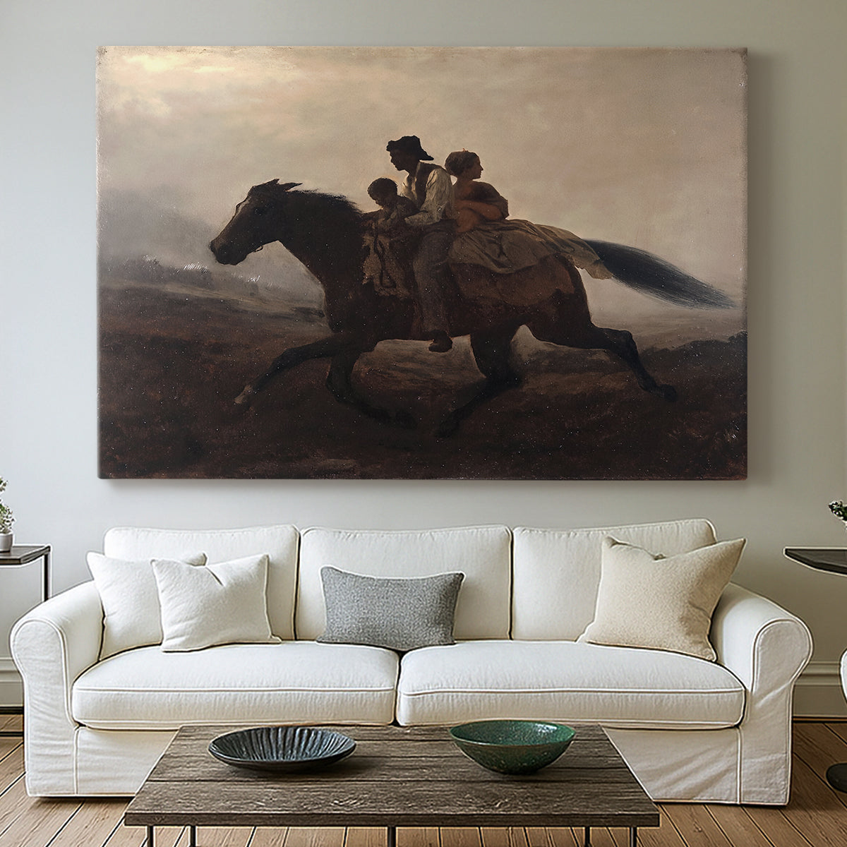 Canvas art print detailing figures on horse moving swiftly through shadowy landscape, centered above a sofa as a large focal wall piece