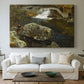Canvas art print detailing a peaceful natural setting with mill and still water, centered above a sofa as a large focal wall piece