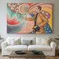 Canvas art print detailing a graphic portrait composition, centered above a sofa as a large focal wall piece