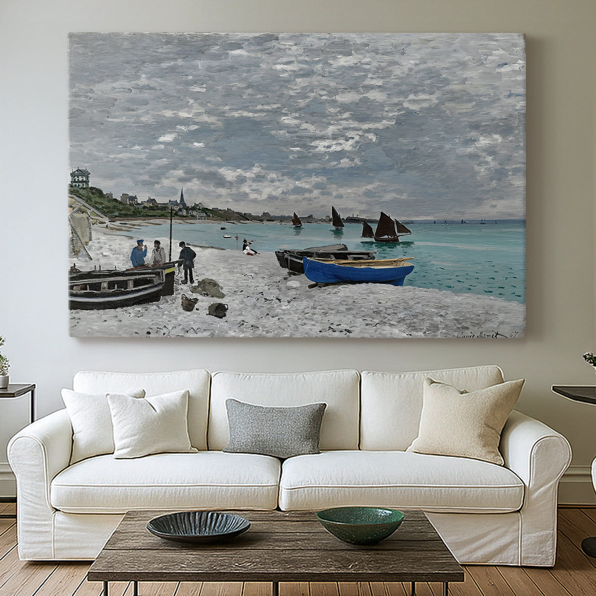 Canvas art print detailing an impressionist seaside gathering with flags and ocean view, centered above a sofa as a large focal wall piece