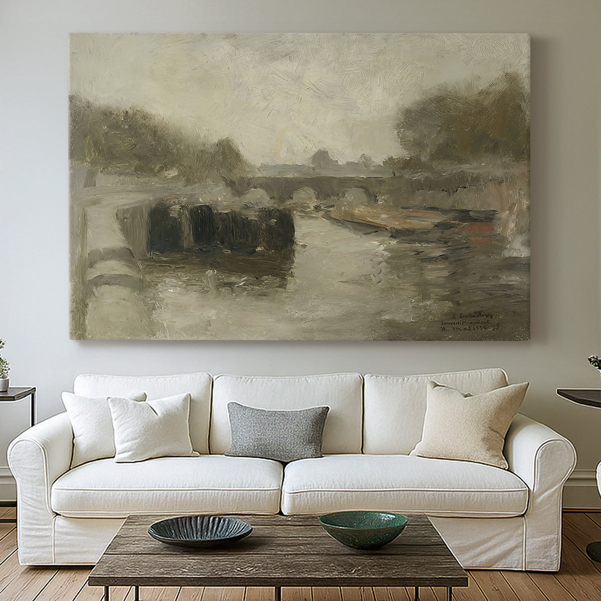 Canvas art print detailing an atmospheric landscape featuring a bridge over water, centered above a sofa as a large focal wall piece