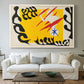 Canvas art print detailing a stylized cut-out design featuring animal imagery, centered above a sofa as a large focal wall piece