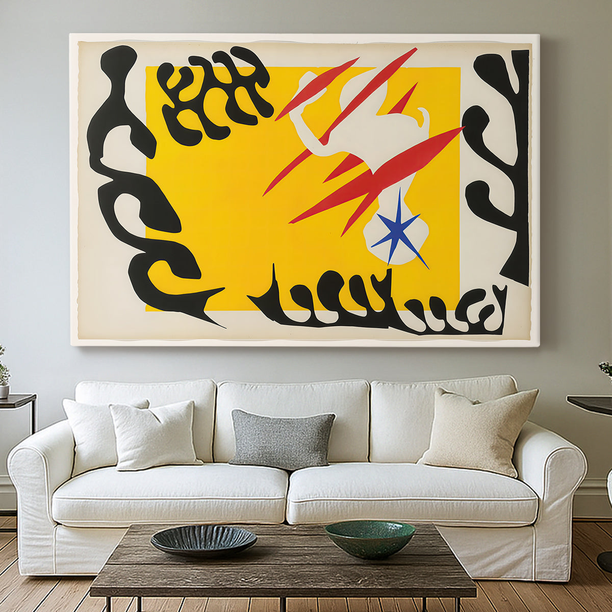 Canvas art print detailing a stylized cut-out design featuring animal imagery, centered above a sofa as a large focal wall piece