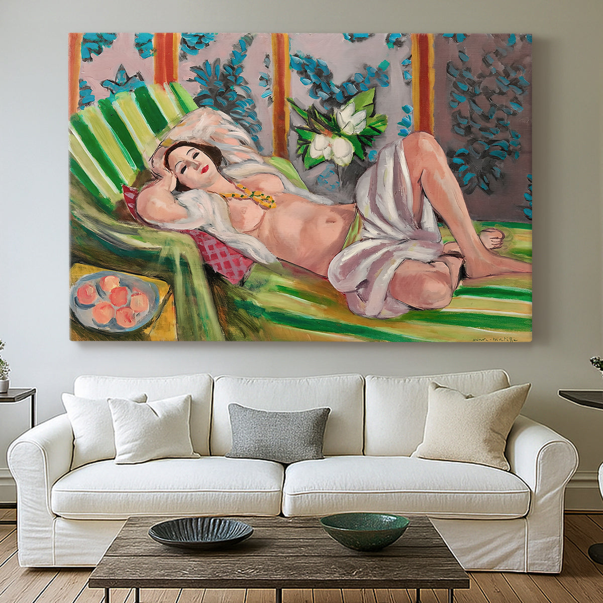 Canvas art print detailing a stylized odalisque in a richly ornamented interior, centered above a sofa as a large focal wall piece