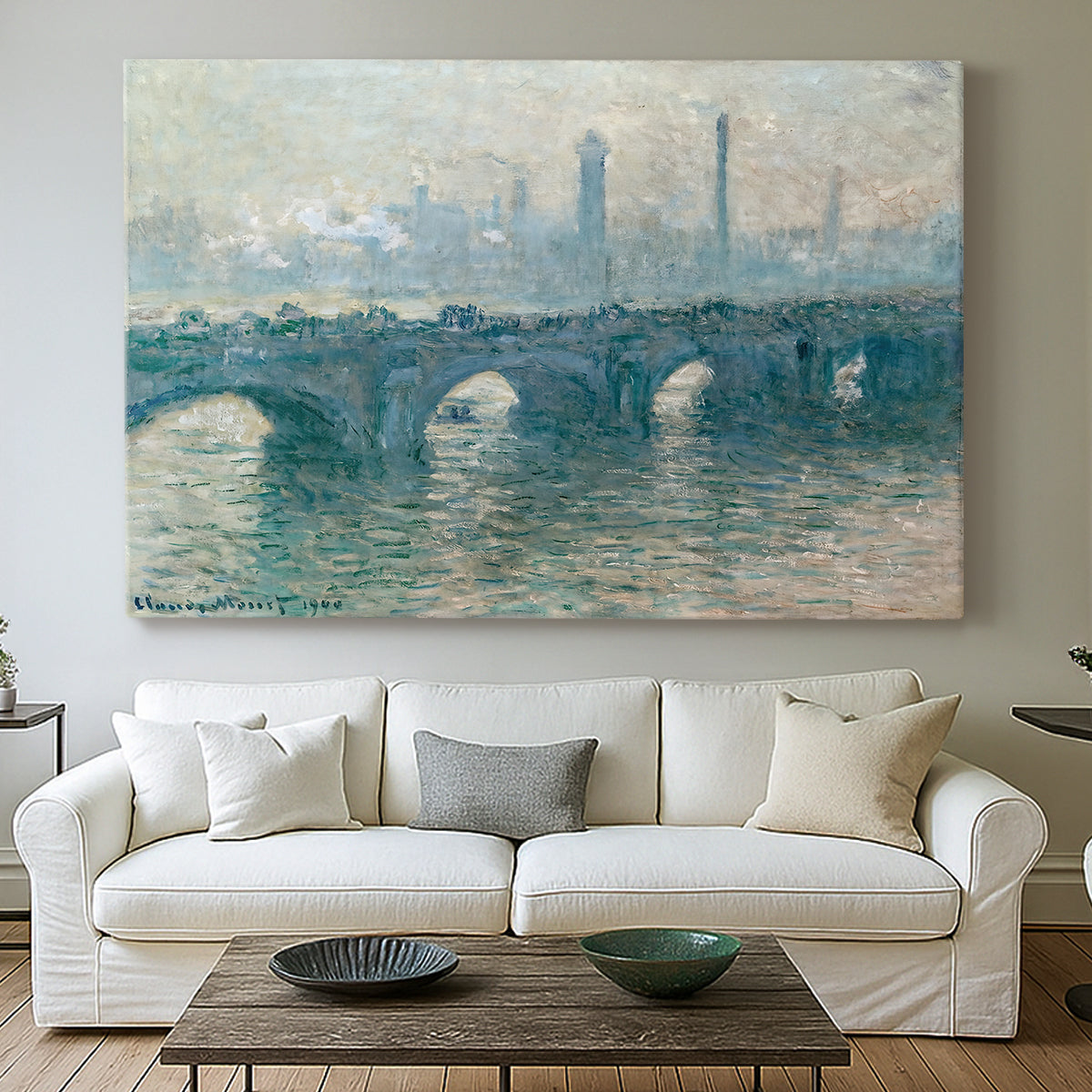 Canvas art print detailing an atmospheric urban landscape with misty light and reflections, centered above a sofa as a large focal wall piece