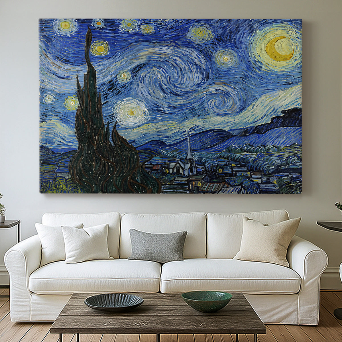 Canvas art print detailing an iconic landscape featuring cypress and luminous stars, centered above a sofa as a large focal wall piece