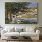 Canvas art print detailing a quiet outdoor setting with figures near river under foliage, centered above a sofa as a large focal wall piece