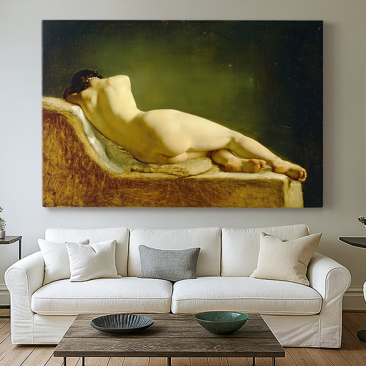 Canvas art print detailing an interior scene focusing on single resting figure, centered above a sofa as a large focal wall piece