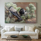 Canvas art print detailing a wildlife painting of dark birds against muted landscape, centered above a sofa as a large focal wall piece