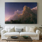 Canvas art print detailing a narrative landscape emphasizing isolation and scale, centered above a sofa as a large focal wall piece