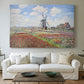 Canvas art print detailing a rural scene with patterned rows of flowers and windmill, centered above a sofa as a large focal wall piece