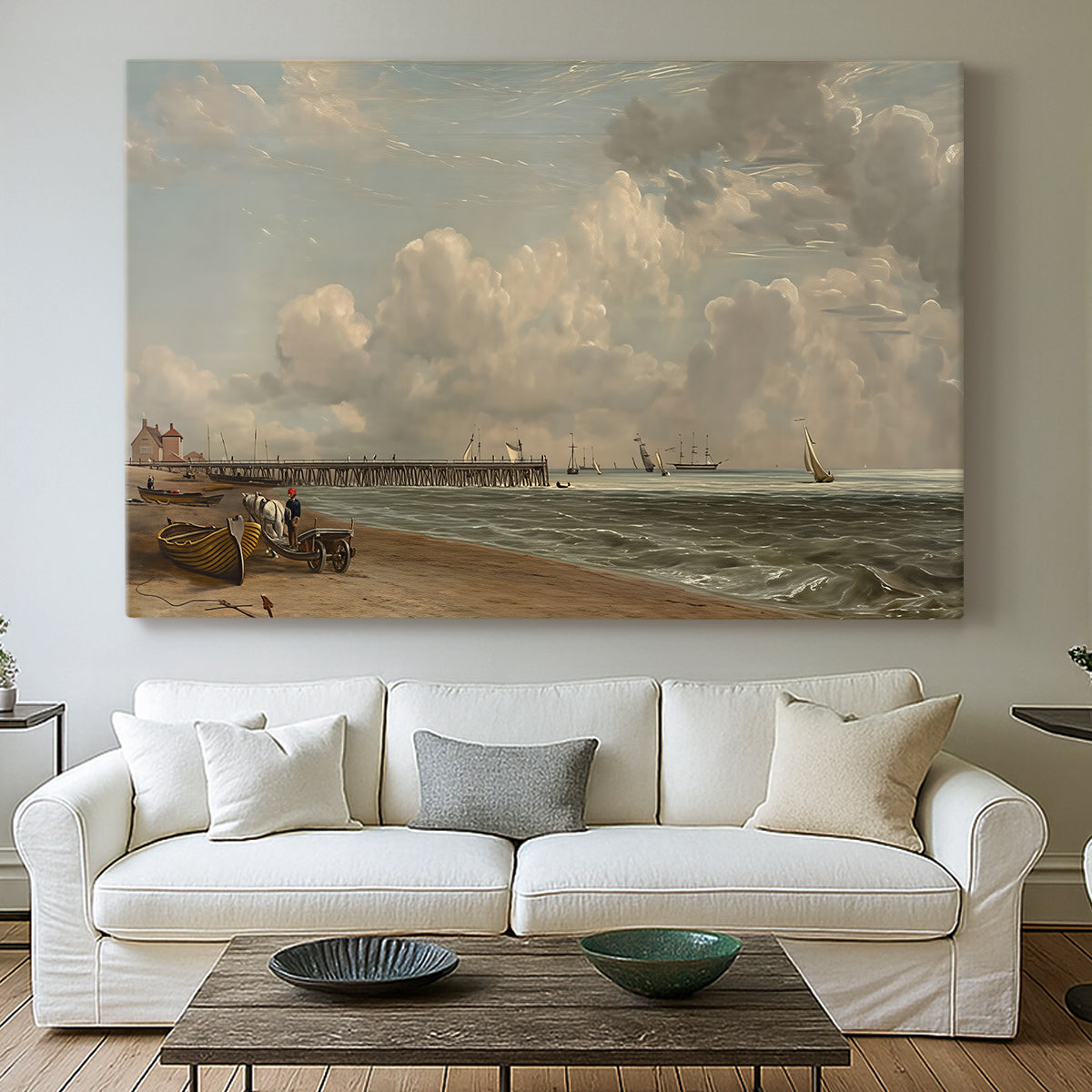 Canvas art print detailing a maritime landscape with shoreline, centered above a sofa as a large focal wall piece