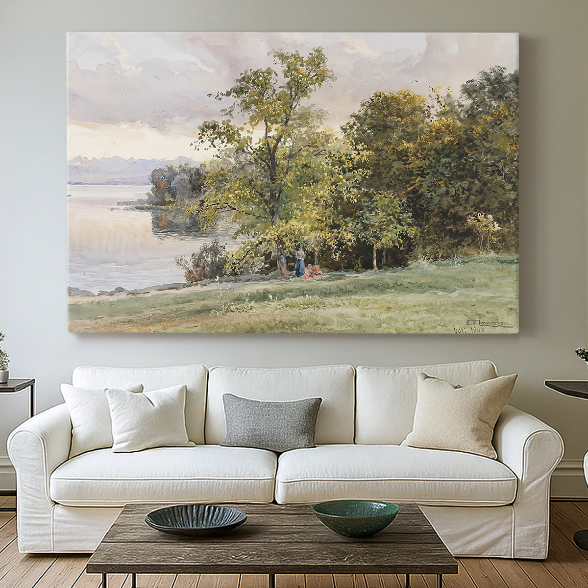 Canvas art print detailing a tranquil lakeside view with soft atmospheric tones, centered above a sofa as a large focal wall piece