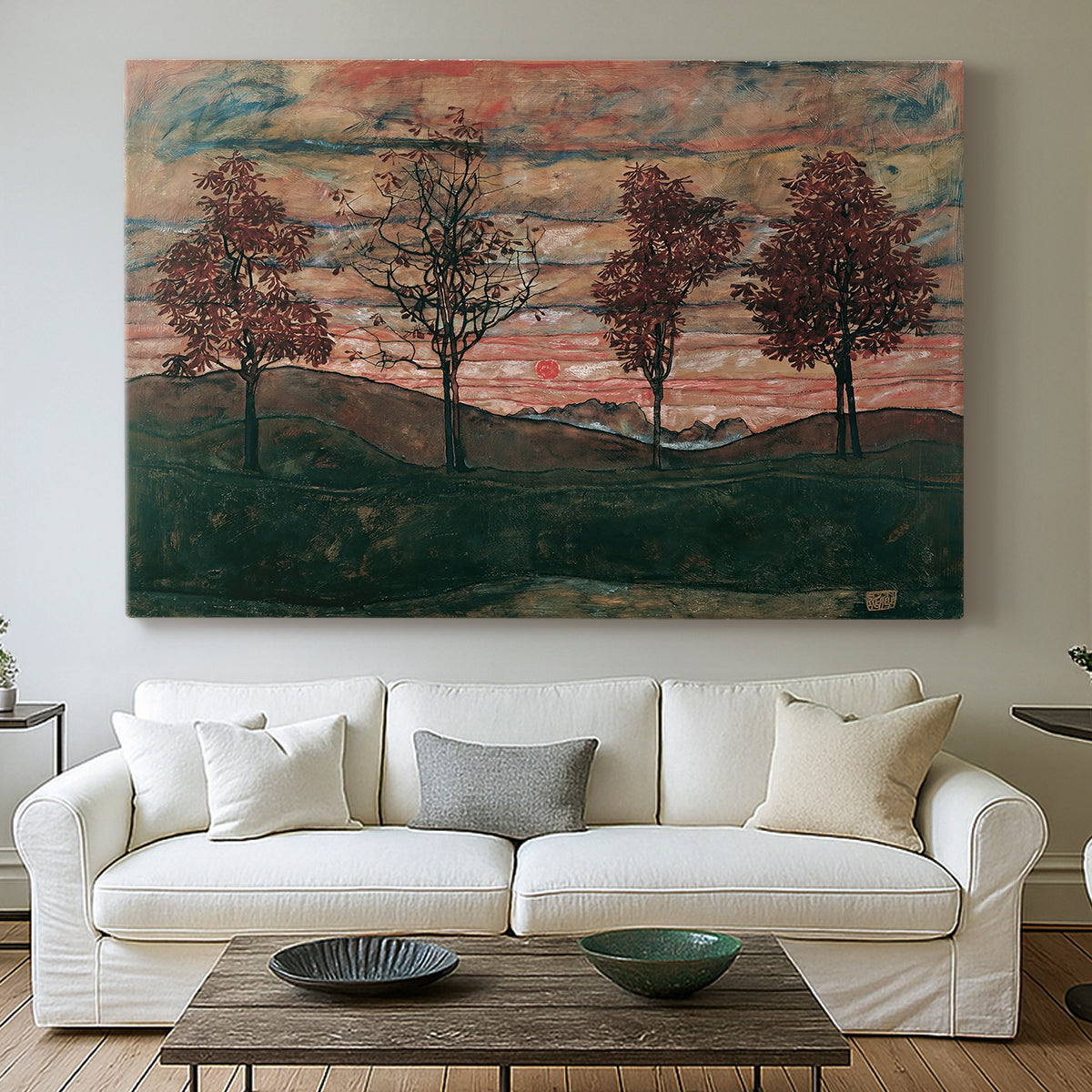 Canvas art print detailing an expressionist landscape featuring isolated trees in field, centered above a sofa as a large focal wall piece