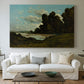Canvas art print detailing an expansive landscape with river and built environment, centered above a sofa as a large focal wall piece
