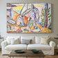 Canvas art print detailing a stylized outdoor composition of figures by the coast, centered above a sofa as a large focal wall piece