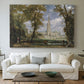 Canvas art print detailing a pastoral setting with cathedral, centered above a sofa as a large focal wall piece