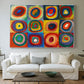 Canvas art print detailing an abstract design focused on color interaction and repetition, centered above a sofa as a large focal wall piece